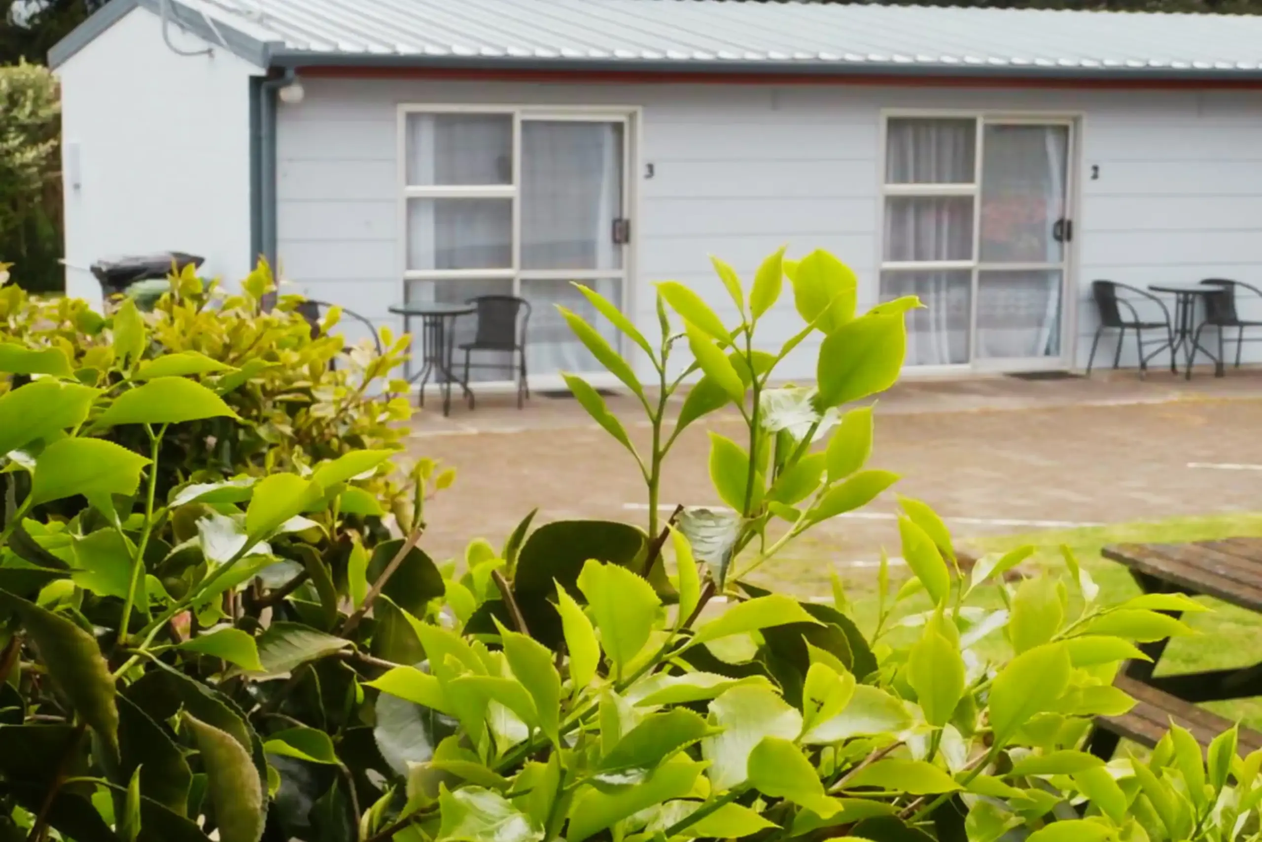 Great Lake Holiday Park Campground Cabin Room Only Simple standard cabin with heating, cooling and TV at Great Lake Holiday Park Taupo.