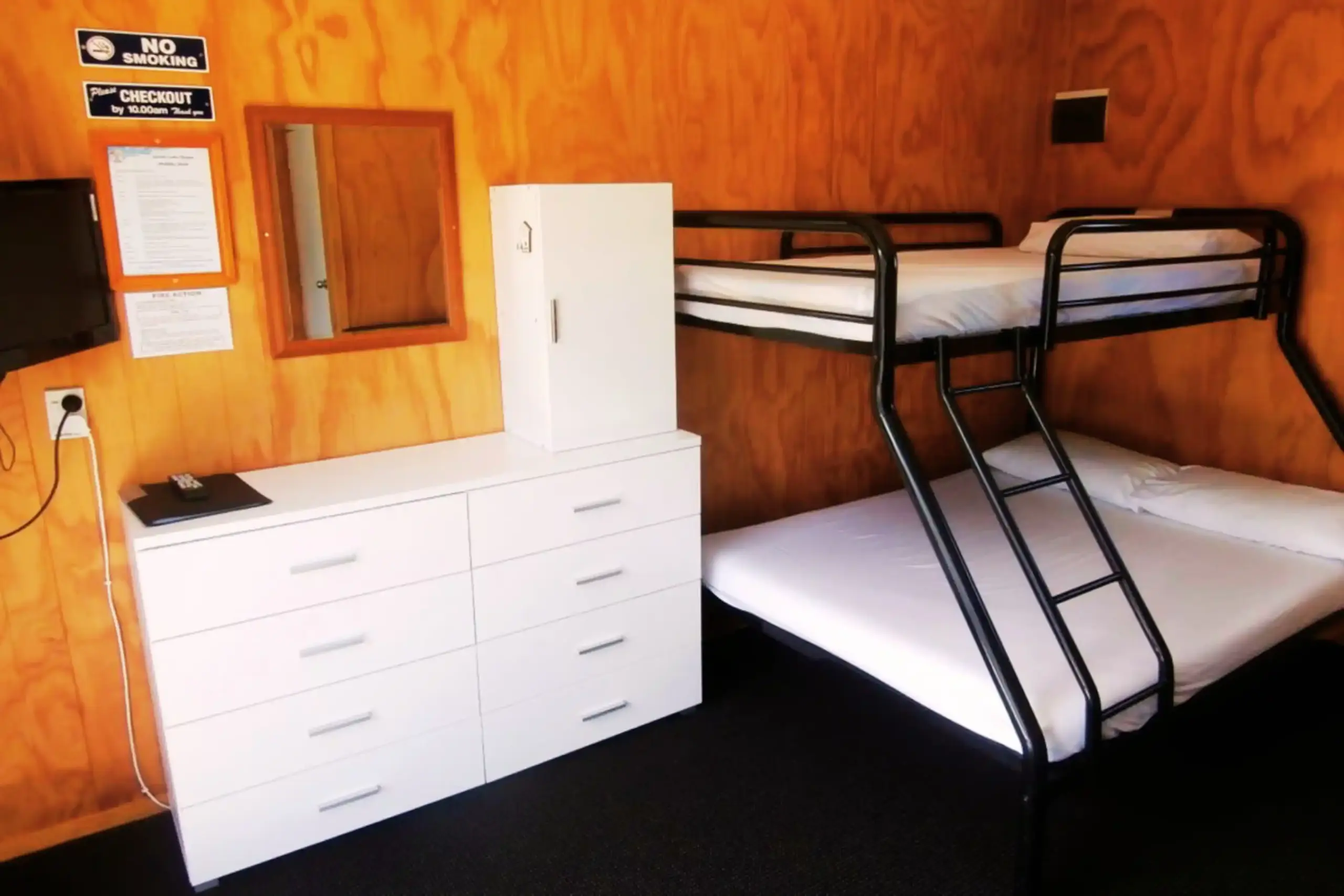Great Lake Holiday Park Campground Cabin with Toilet Inside Cosy deluxe cabin with private toilet, heating, cooling and TV at Great Lake Holiday Park Taupo.